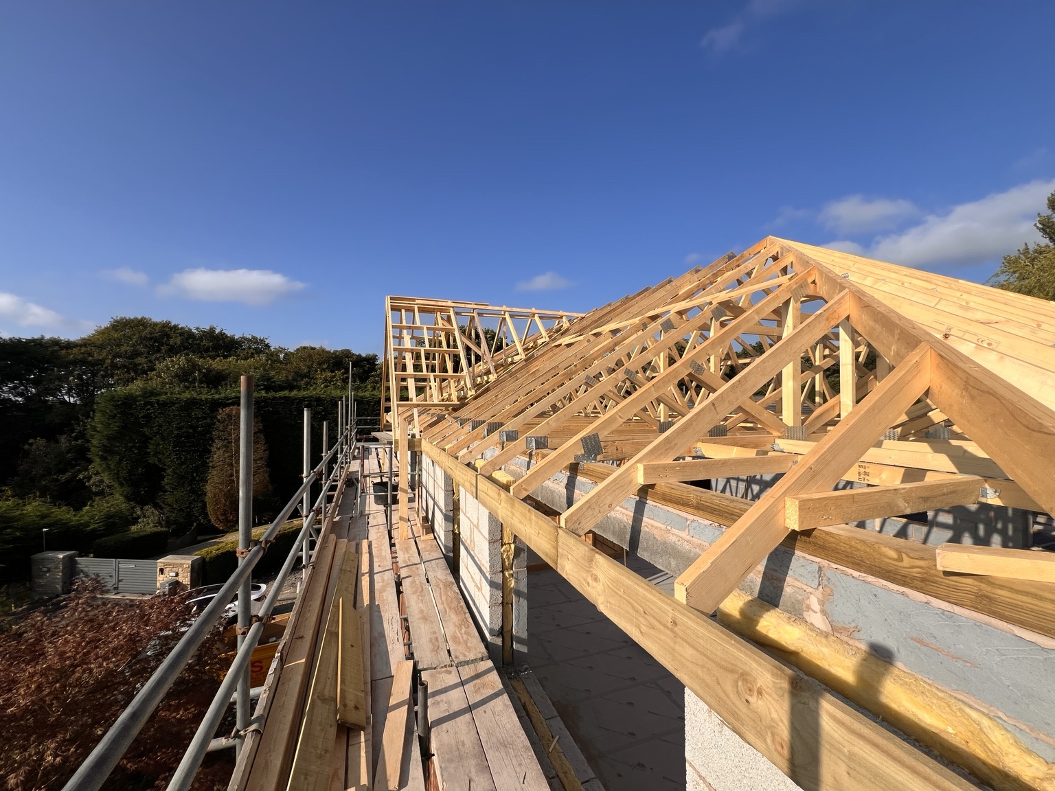 Roof construction in progress on a HOME project