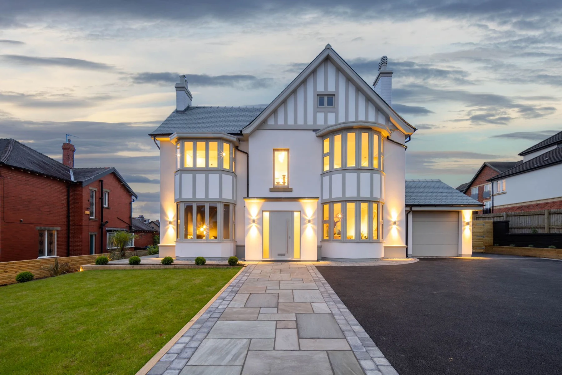 The completed Longsight Road home at dusk